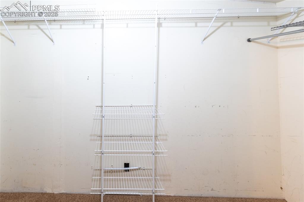 7940 Edison Road Yoder, CO 80864 - Photo 28 of 38 a view of a room with racks on the wall