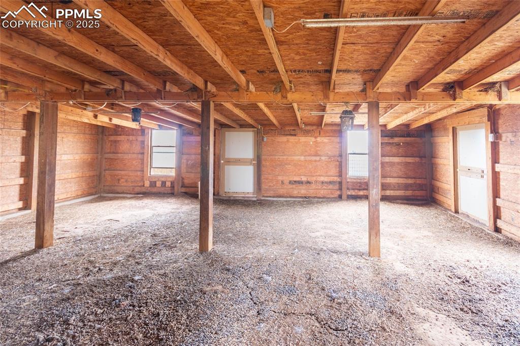 7940 Edison Road Yoder, CO 80864 - Photo 36 of 38 a view of a room with a wooden roof