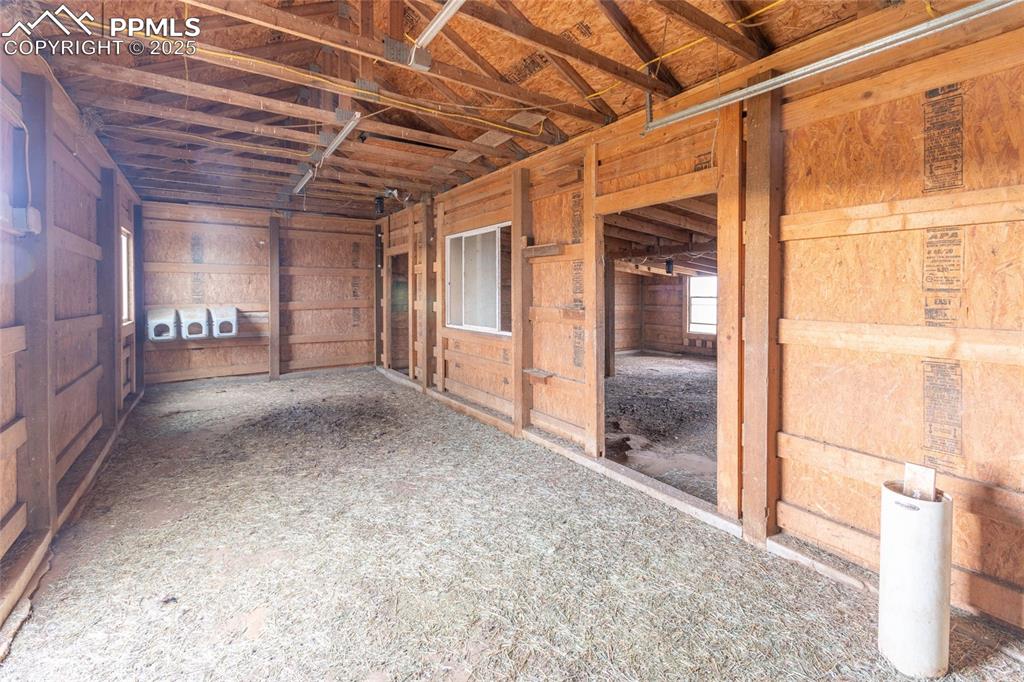7940 Edison Road Yoder, CO 80864 - Photo 8 of 38 a view of a room with wooden walls