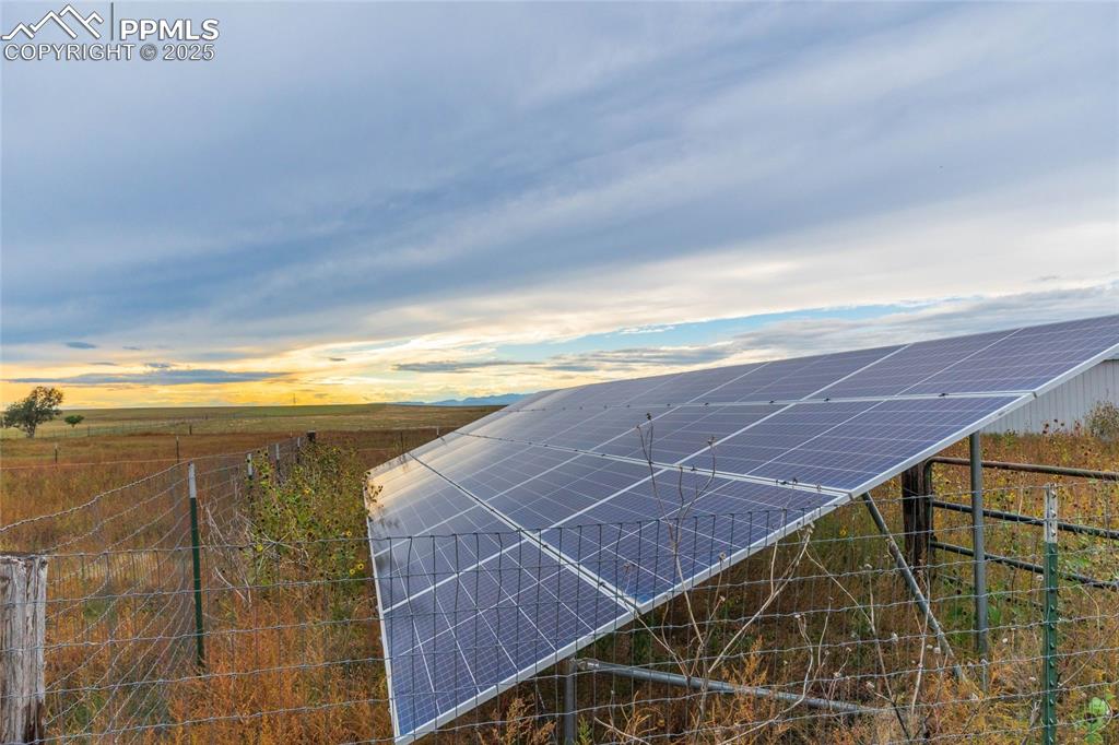 7940 Edison Road Yoder, CO 80864 - Photo 10 of 38 a view of an empty room with wooden floor