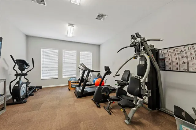 a view of a room with gym equipment