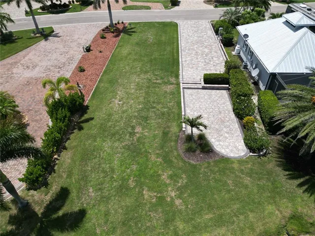 an aerial view of a house with garden