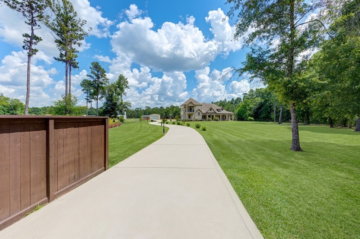 21038 Angus Drive Cleveland, TX 77328 - Photo 2 of 49 a view of a park with large trees