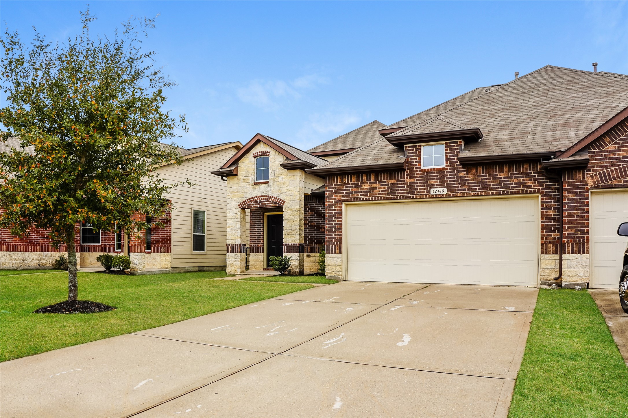 12419 Maura Lane Houston, TX 77044 - Photo 1 of 11 a front view of house with yard