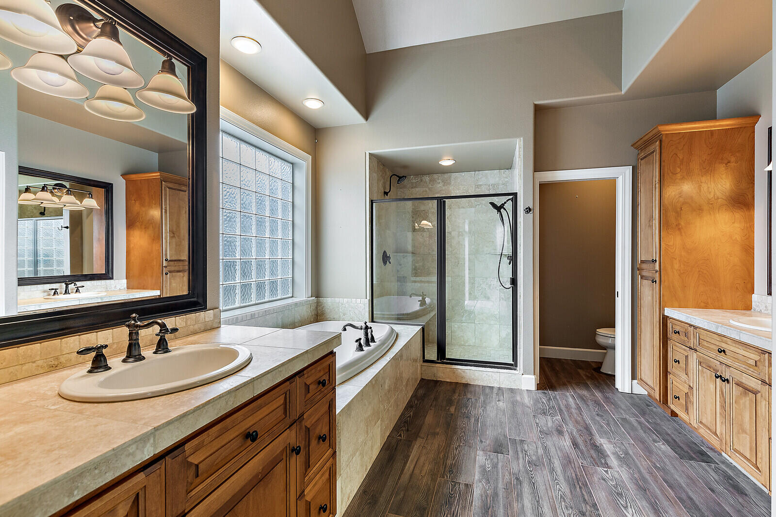 2225 Old Stage Road Central Point, OR 97502 - Photo 15 of 37 a bathroom with a granite countertop sink shower and a mirror