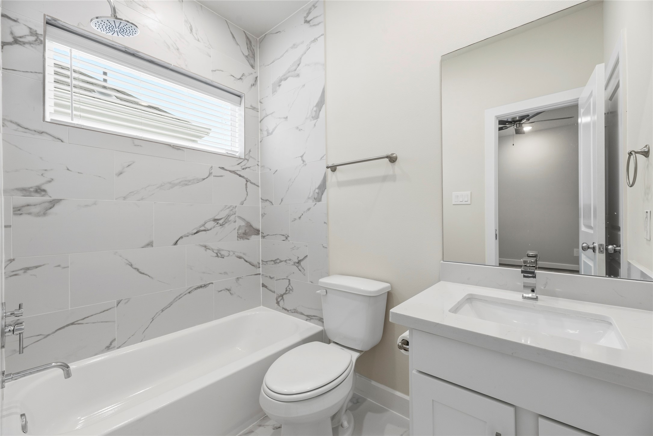 3075 Hicks Street Houston, TX 77007 - Photo 27 of 34 a bathroom with a sink toilet and shower
