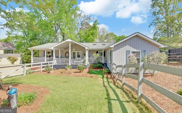 front view of a house with a small yard