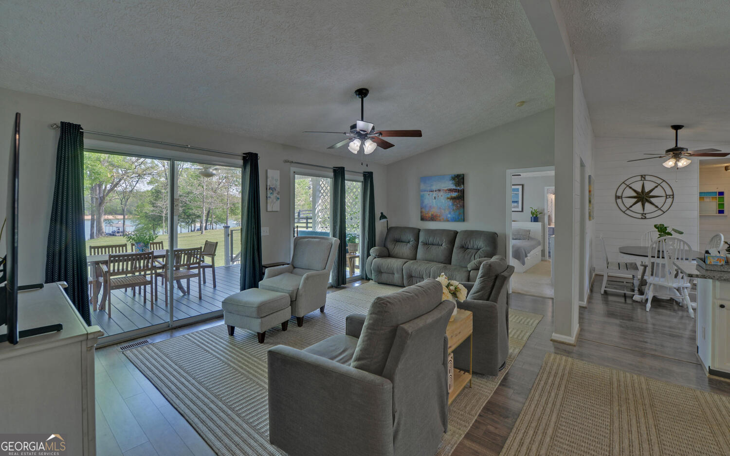 809 Glenn Ferry Road Fair Play, SC 29643 - Photo 22 of 78 a living room with furniture and a large window