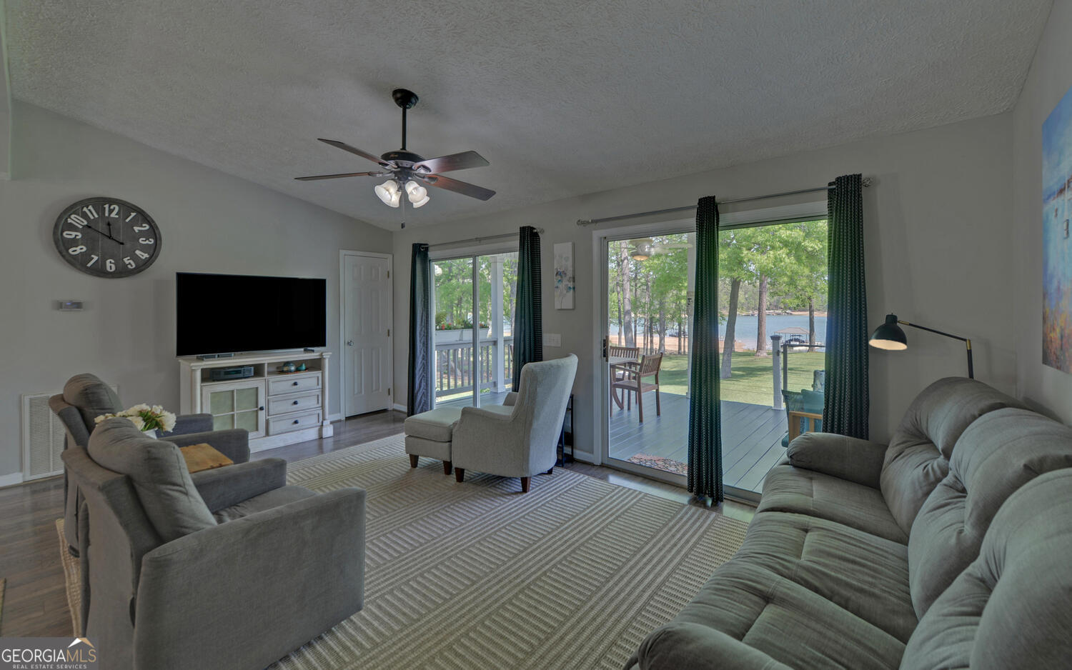 809 Glenn Ferry Road Fair Play, SC 29643 - Photo 23 of 78 a living room with furniture and a flat screen tv
