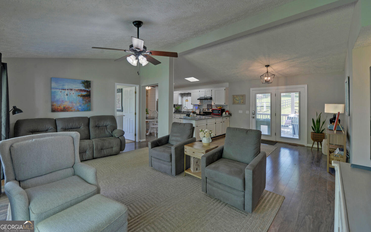 809 Glenn Ferry Road Fair Play, SC 29643 - Photo 25 of 78 a living room with furniture and a chandelier