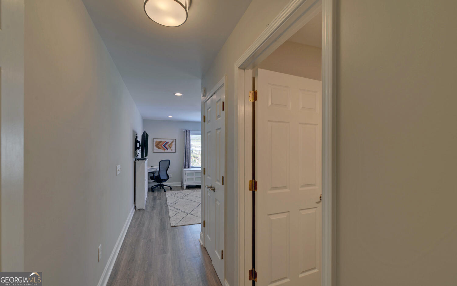 809 Glenn Ferry Road Fair Play, SC 29643 - Photo 28 of 78 a view of a hallway with wooden floor and a bathroom