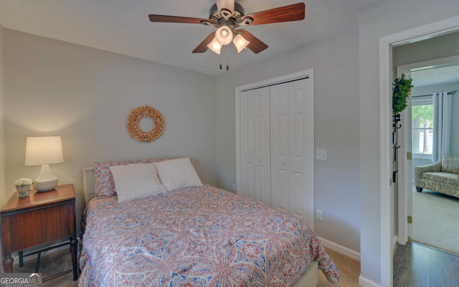 809 Glenn Ferry Road Fair Play, SC 29643 - Photo 43 of 78 a bedroom with a bed and a chandelier