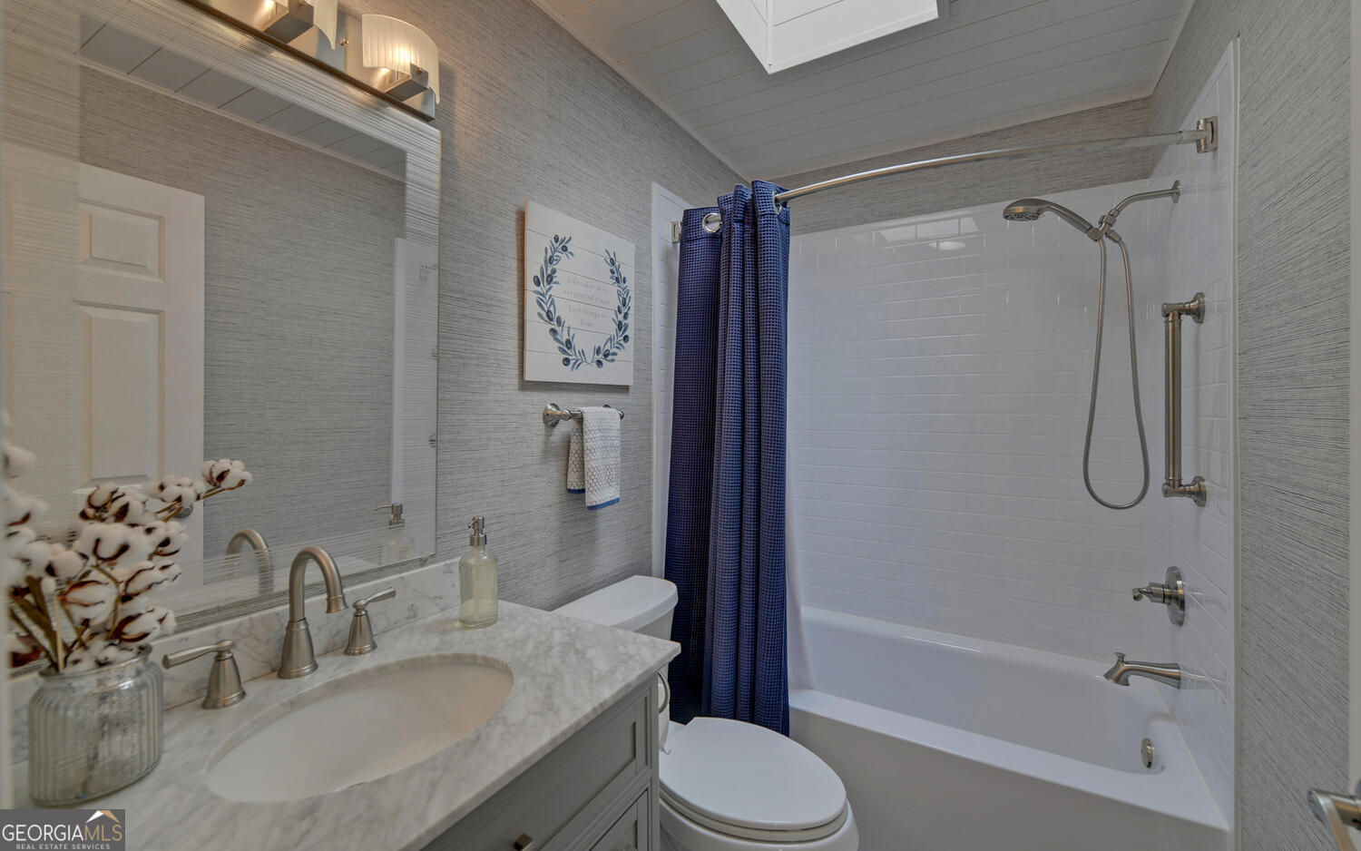 809 Glenn Ferry Road Fair Play, SC 29643 - Photo 47 of 78 a bathroom with a sink toilet and shower