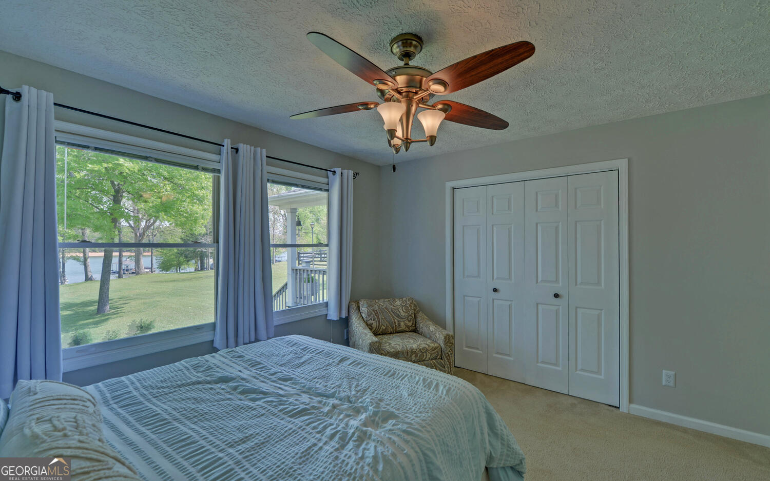 809 Glenn Ferry Road Fair Play, SC 29643 - Photo 49 of 78 a bedroom with a large bed and a window