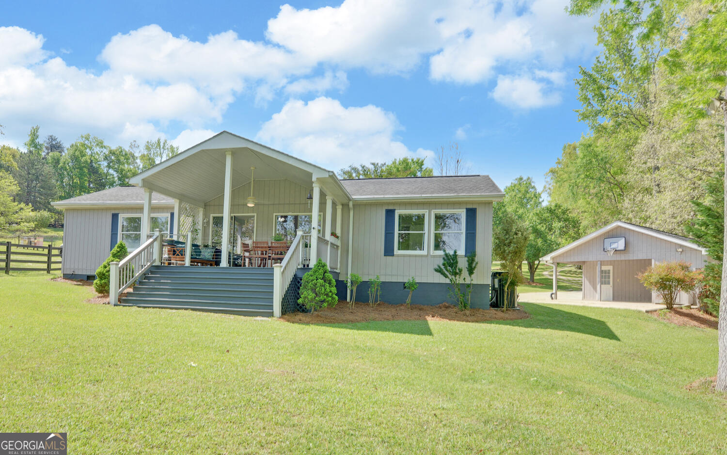 809 Glenn Ferry Road Fair Play, SC 29643 - Photo 5 of 78 a front view of a house with garden
