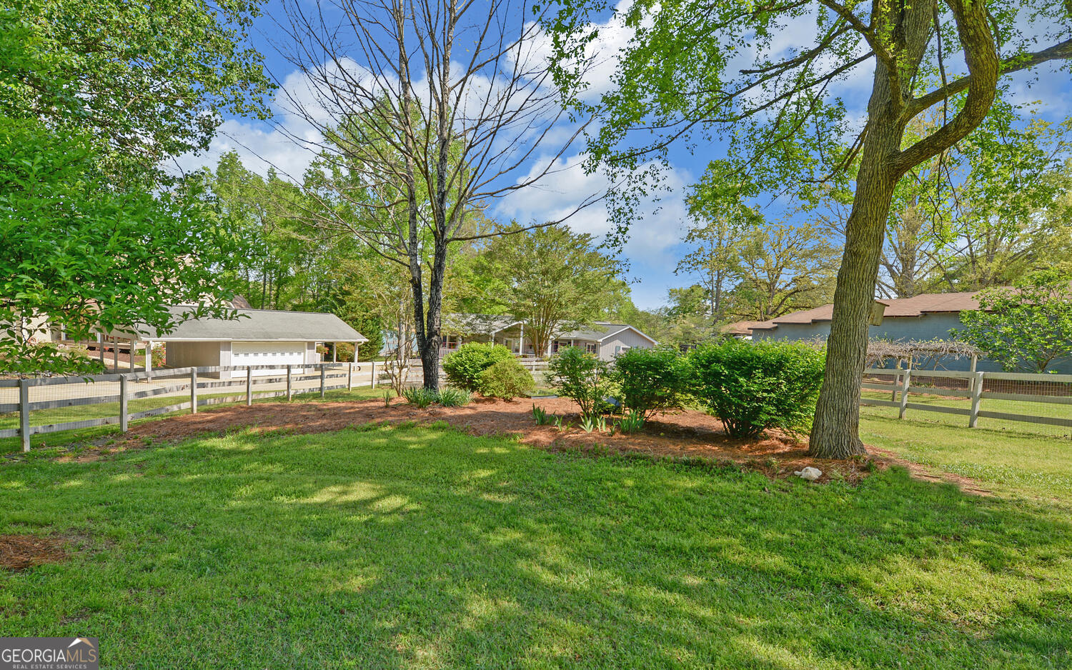 809 Glenn Ferry Road Fair Play, SC 29643 - Photo 56 of 78 a view of a house with a yard and sitting area