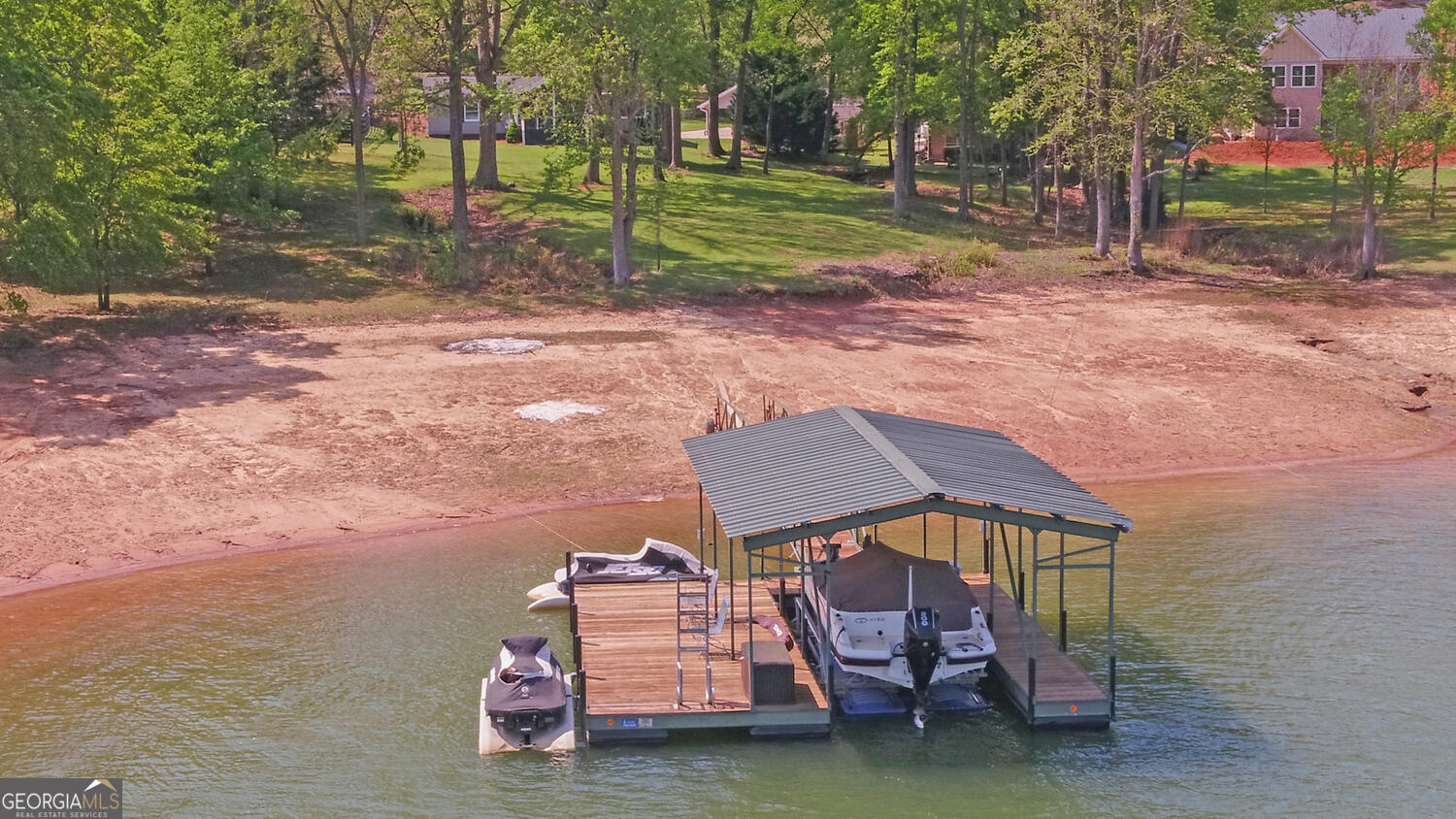 809 Glenn Ferry Road Fair Play, SC 29643 - Photo 74 of 78 a backyard of a house with barbeque oven table and chairs