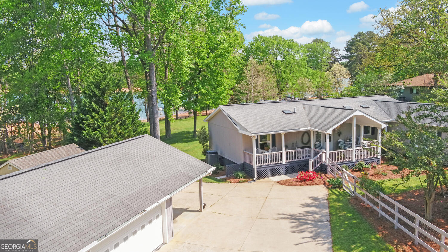 809 Glenn Ferry Road Fair Play, SC 29643 - Photo 8 of 78 a view of a house with a backyard and balcony