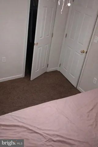 a view of a big room with windows