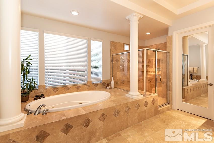 2675 Colmar Court Reno, NV 89521 - Photo 15 of 25 a spacious bathroom with sink shower and bathtub
