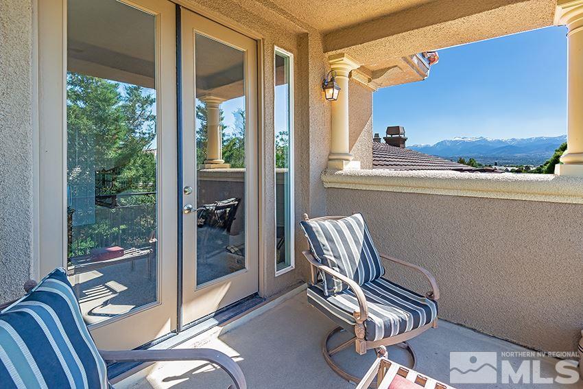 2675 Colmar Court Reno, NV 89521 - Photo 20 of 25 a view of chair in balcony with wooden floor