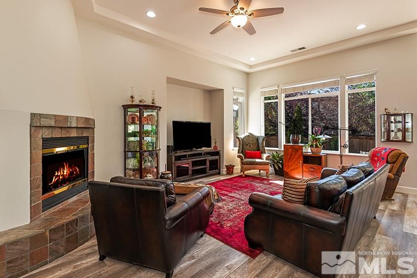 2675 Colmar Court Reno, NV 89521 - Photo 8 of 25 a living room with furniture and a flat screen tv