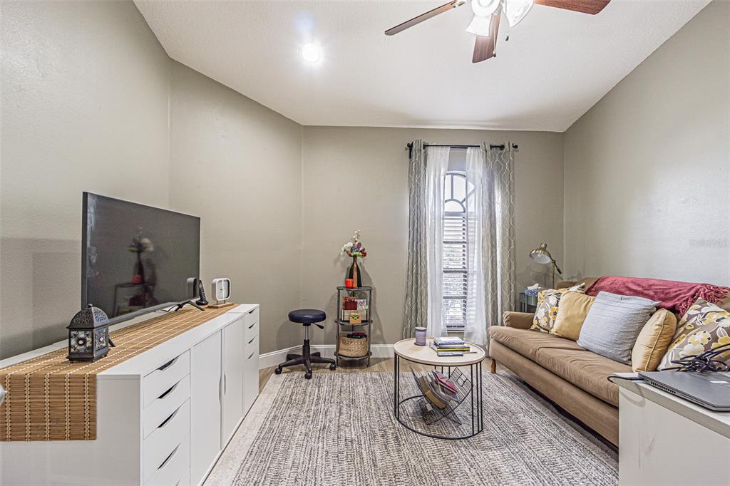 9809 La Rita Place Riverview, FL 33569 - Photo 37 of 59 a living room with furniture and a flat screen tv