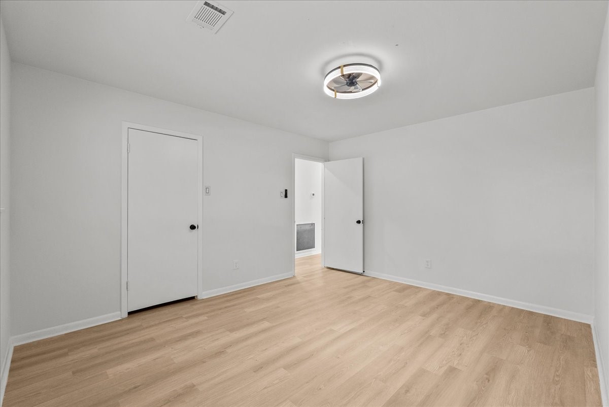 5762 Birdwood Road Houston, TX 77096 - Photo 19 of 50 BEDROOM #2 ALSO TOWARDS FRONT OF HOME WITH AMPLE CLOSET SPACE.