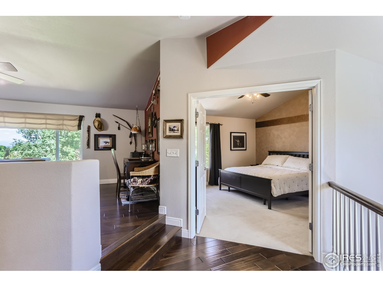 6626 Silverleaf Avenue Firestone, CO 80504 - Photo 15 of 27 a bedroom with a bed and a large window