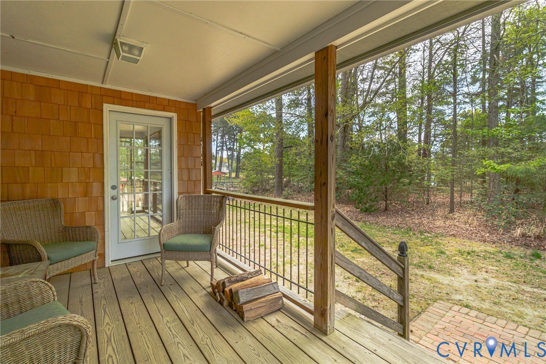 193 Deep Water Lane Reedville, VA 22539 - Photo 73 of 84 a view of a balcony with wooden floor