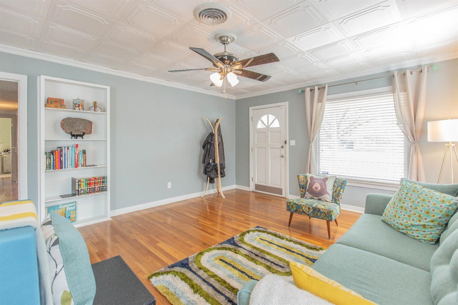 3204 26th Street Lubbock, TX 79410 - Photo 6 of 10 a living room with furniture and a large window