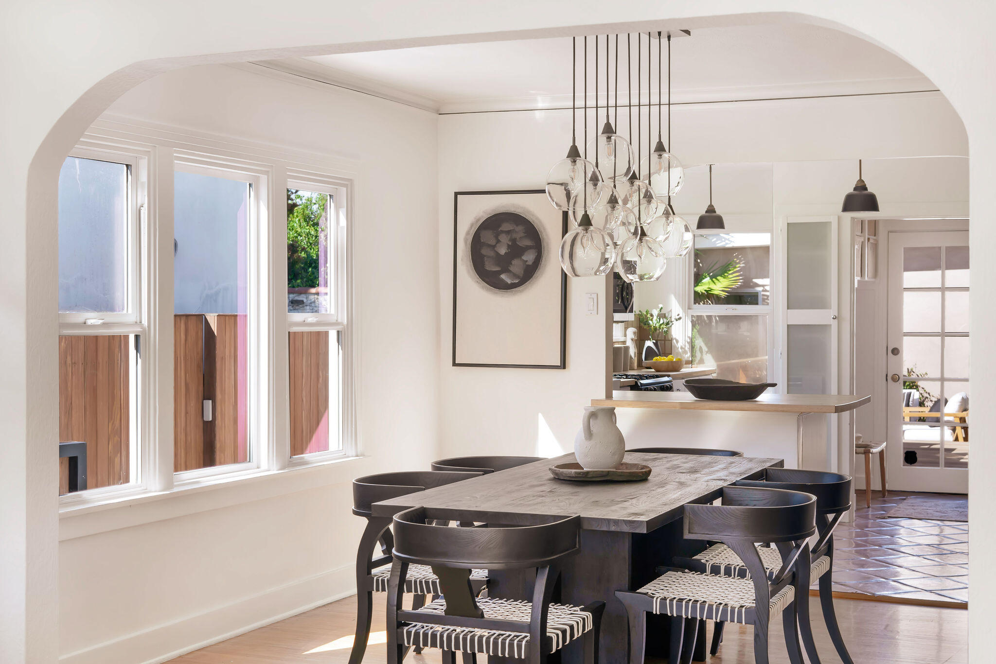 1317 Keniston Avenue Los Angeles, CA 90019 - Photo 11 of 57 a view of a dining room with furniture and wooden floor