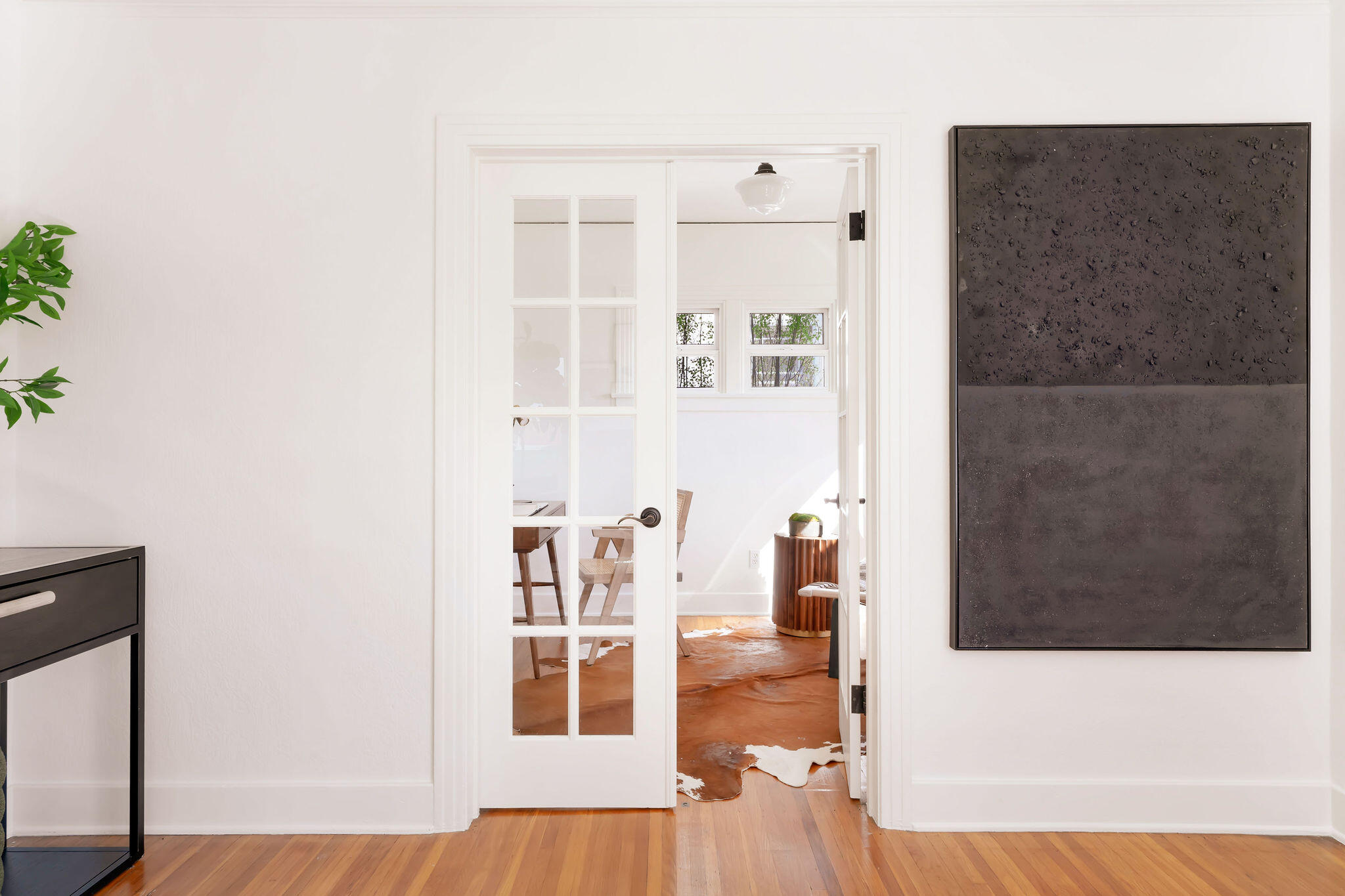 1317 Keniston Avenue Los Angeles, CA 90019 - Photo 21 of 57 a view of a living room with furniture