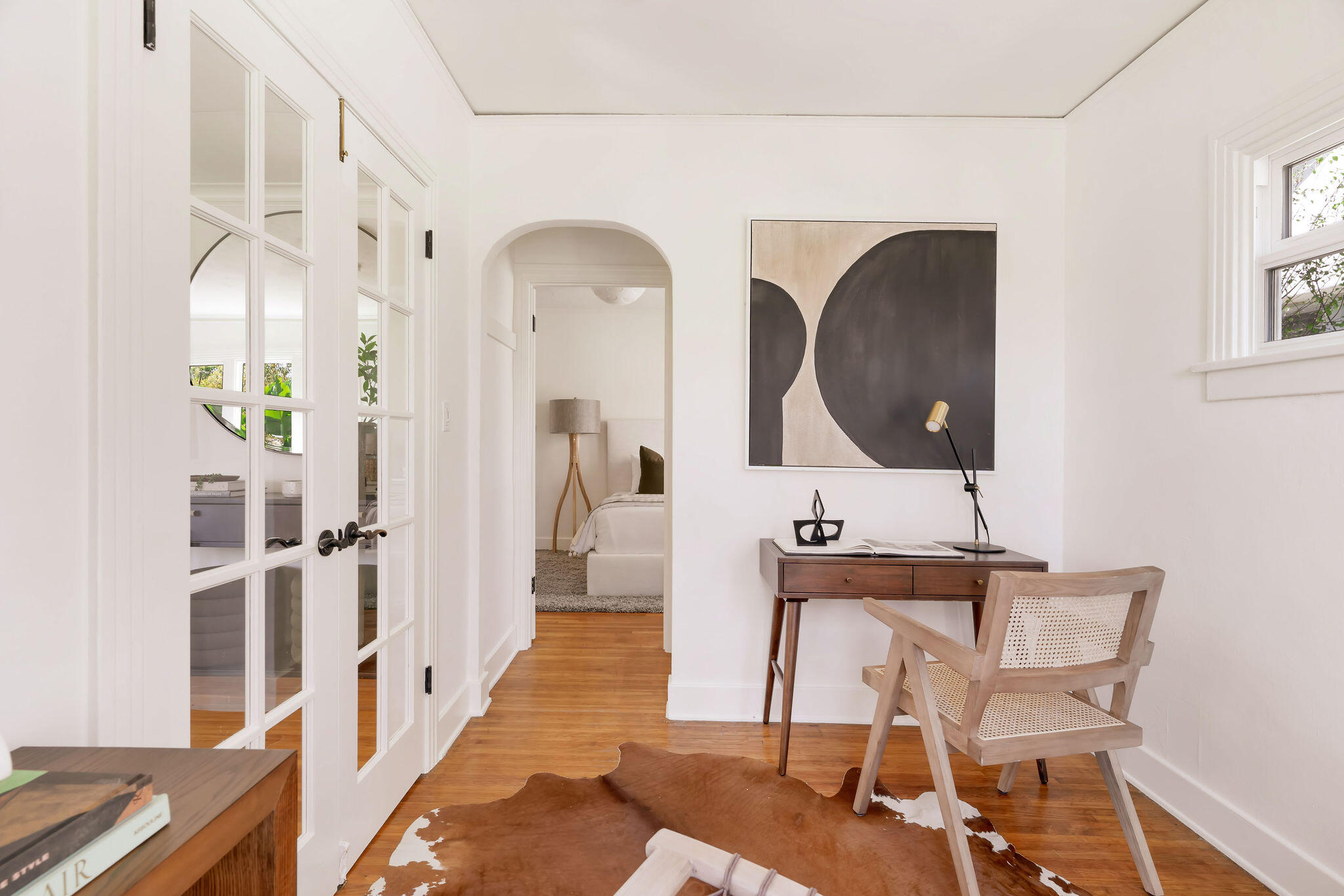 1317 Keniston Avenue Los Angeles, CA 90019 - Photo 22 of 57 a living room with furniture