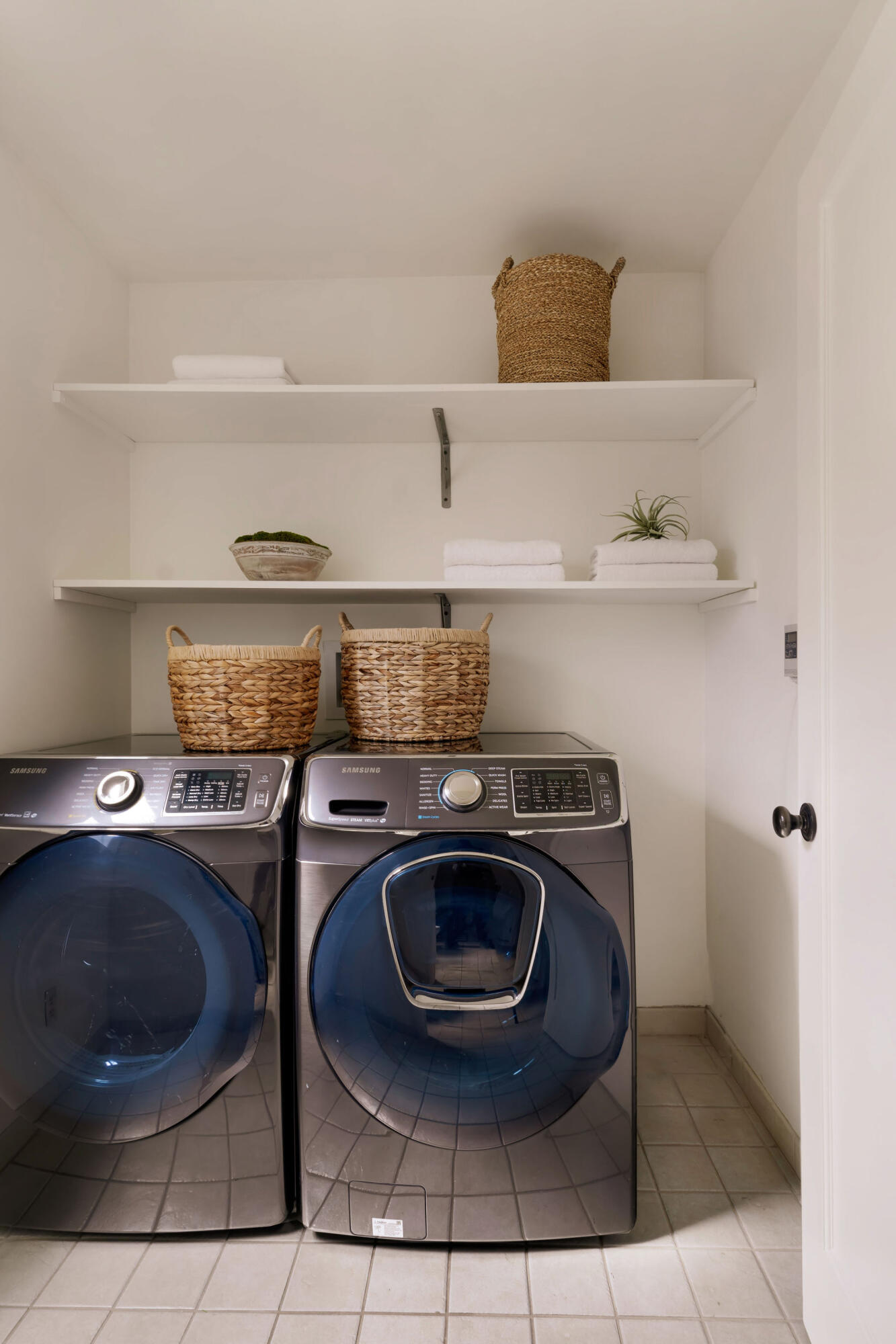 1317 Keniston Avenue Los Angeles, CA 90019 - Photo 34 of 57 a kitchen with a stove a refrigerator and wooden floor