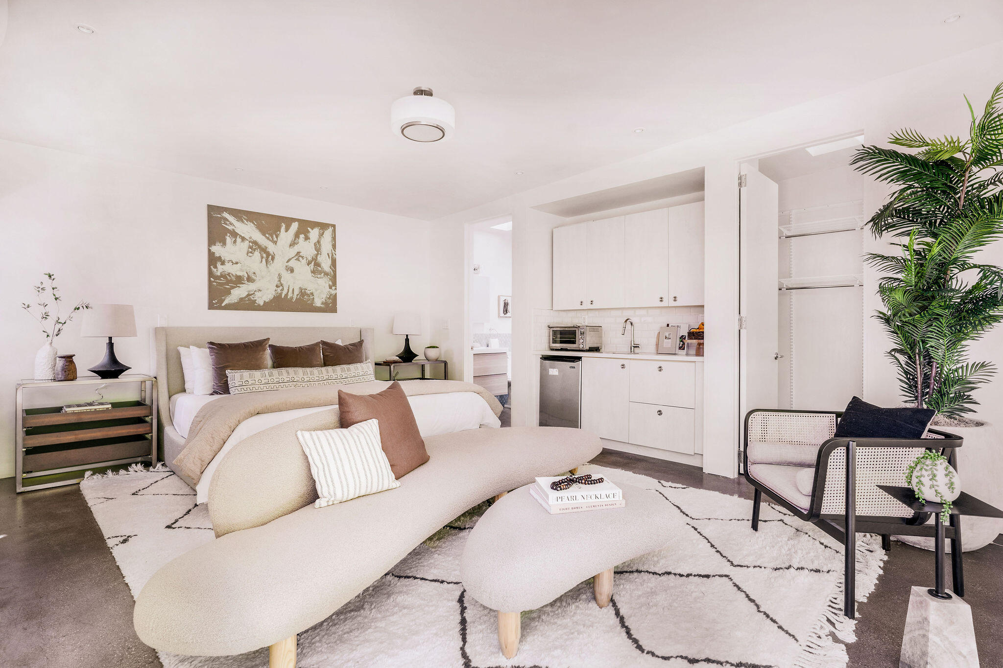 1317 Keniston Avenue Los Angeles, CA 90019 - Photo 41 of 57 a living room with furniture and white walls