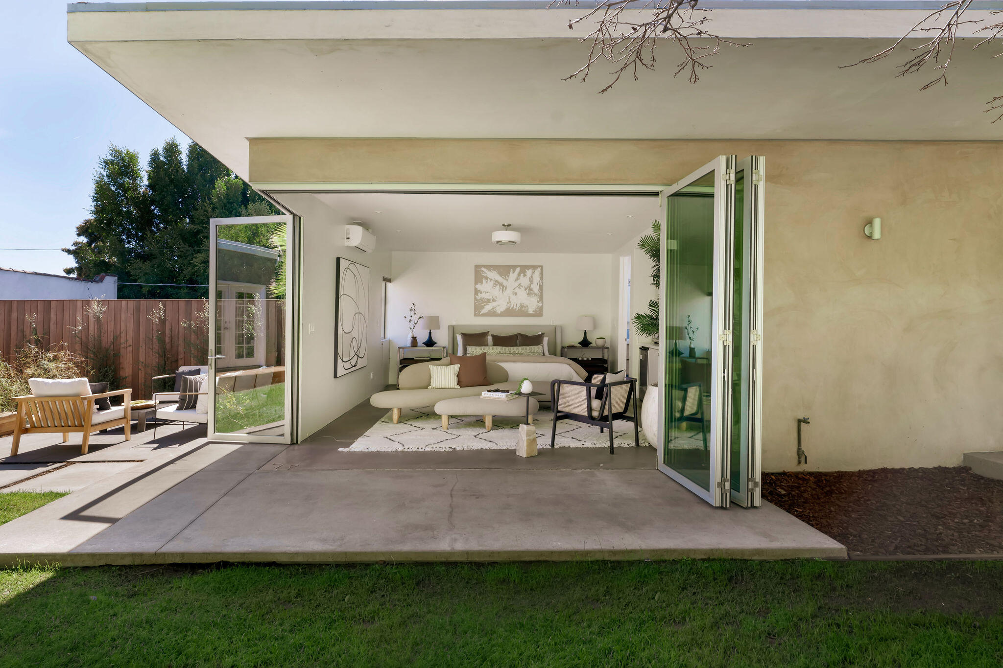 1317 Keniston Avenue Los Angeles, CA 90019 - Photo 50 of 57 a view of a house with backyard and patio