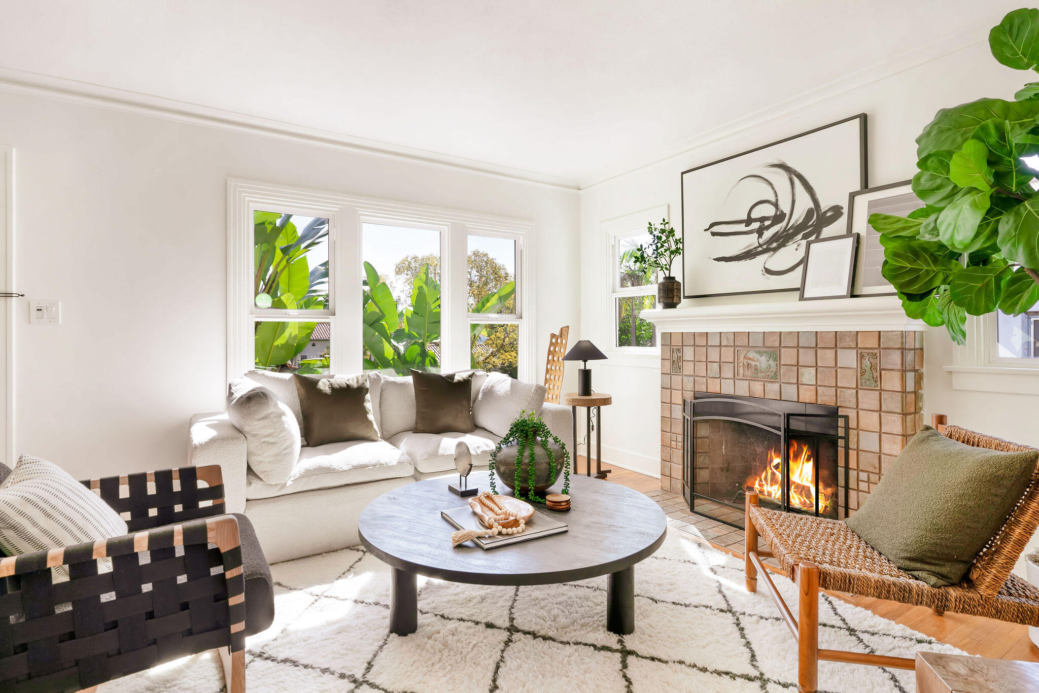 1317 Keniston Avenue Los Angeles, CA 90019 - Photo 5 of 57 a living room with furniture and a fireplace