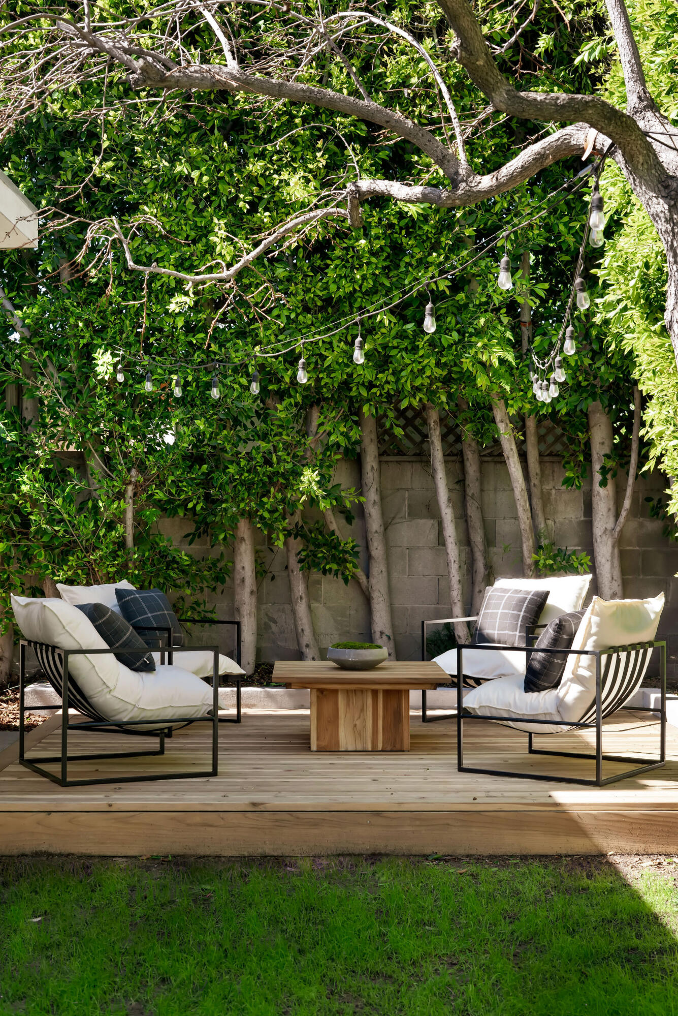 1317 Keniston Avenue Los Angeles, CA 90019 - Photo 54 of 57 a house view with a sitting space and garden