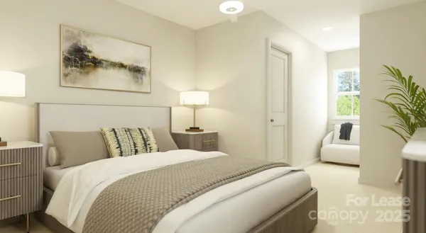 a bedroom with a large bed and a couch