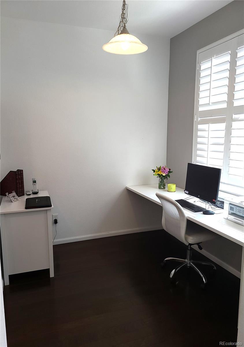 9492 Cedarhurst Lane, Unit B Highlands Ranch, CO 80129 - Photo 16 of 17 a workspace with furniture and window