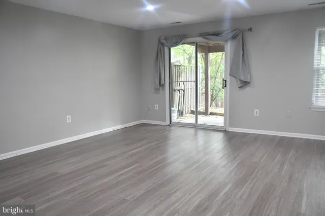 a view of a livingroom with a window