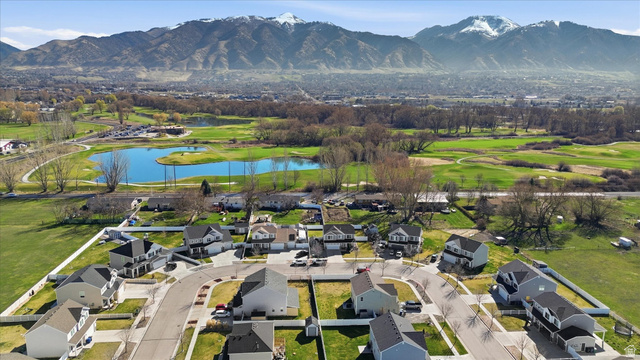 1084 South 740 East Logan, UT 84321 - Photo 20 of 23 Aerial view of residential area featuring a water and mountain view and a golf course