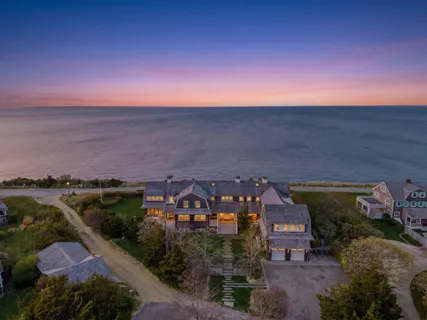 an aerial view of a house with a garden