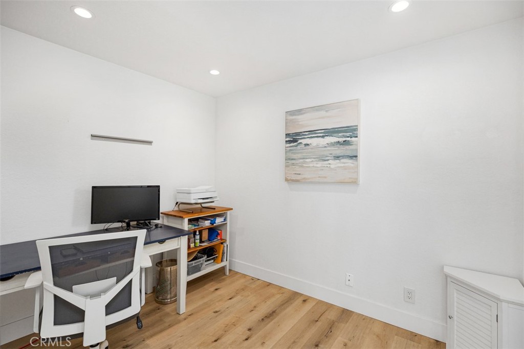 24562 Harbor View Drive, Unit 18 Dana Point, CA 92629 - Photo 13 of 33 a room with furniture and wooden floor