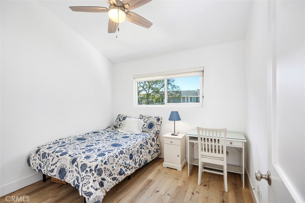 24562 Harbor View Drive, Unit 18 Dana Point, CA 92629 - Photo 14 of 33 a bedroom with a bed and a window