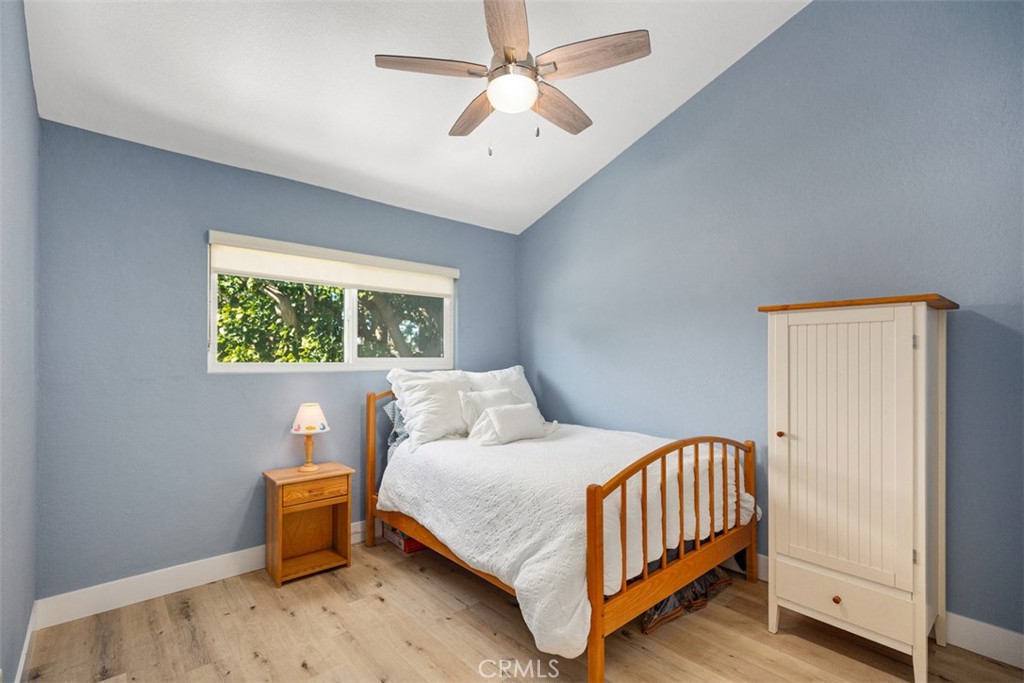 24562 Harbor View Drive, Unit 18 Dana Point, CA 92629 - Photo 15 of 33 a bedroom with a bed and a window