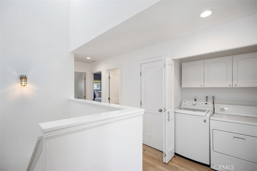 24562 Harbor View Drive, Unit 18 Dana Point, CA 92629 - Photo 17 of 33 a view of storage and utility room with washer and dryer