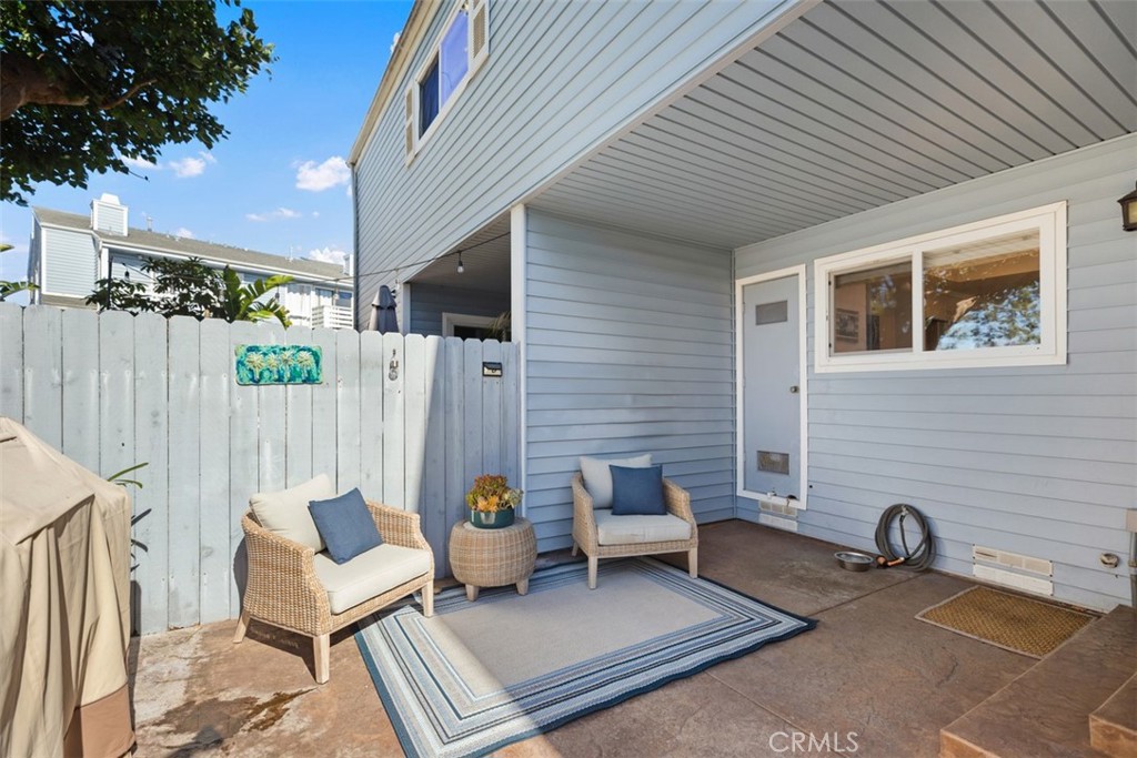 24562 Harbor View Drive, Unit 18 Dana Point, CA 92629 - Photo 23 of 33 a view of a chairs in a patio