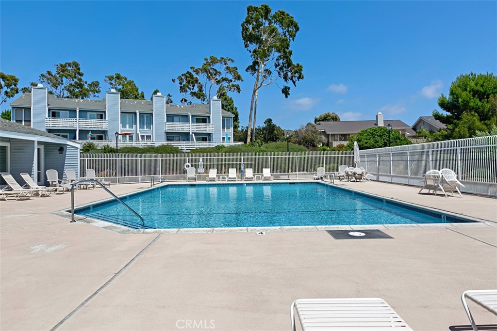 24562 Harbor View Drive, Unit 18 Dana Point, CA 92629 - Photo 27 of 33 a view of a house with a swimming pool